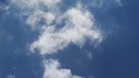 Blue sky as the clouds travel blown by the wind