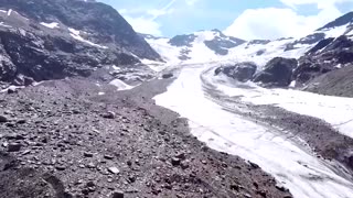 Video shows Italian Alpine glacier melting in summer heat