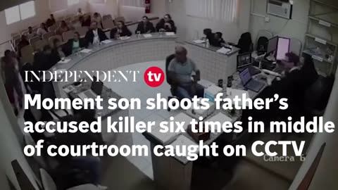 SON SHOOTS FATHER'S ACCUSSED KILLER