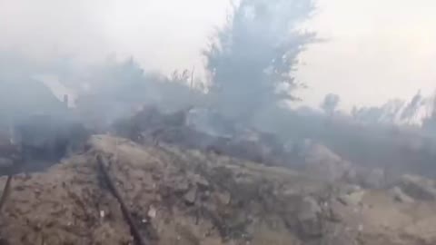 Ukrainian soldiers after Russian Armed Forces shelling