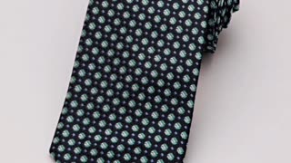 "Add a pop of personality to your suit with La Mode Men's stylish patterned ties