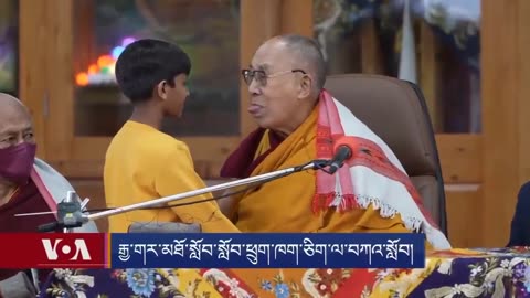 Pervert Dalai Lama Asking Young Boy To Suck His Tongue