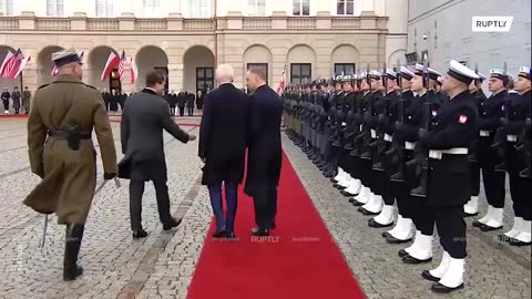 President Biden in Poland has to be guided to stay on the red carpet.