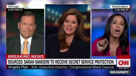 CNN hack Angela Ryes screams at Trump supporter Steve Cortes.