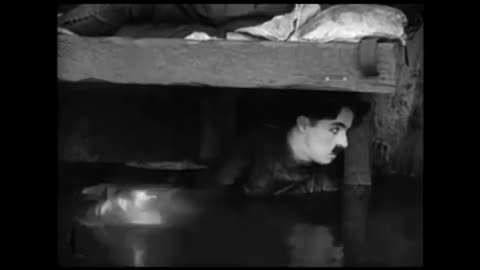 Charlie Chaplin - L comme Lit