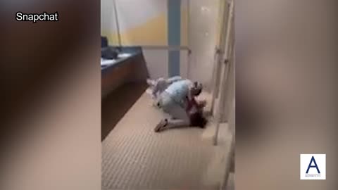 Bathroom brawl at school captured on video