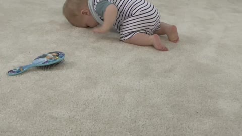 Baby Crawls Face First Across the Floor