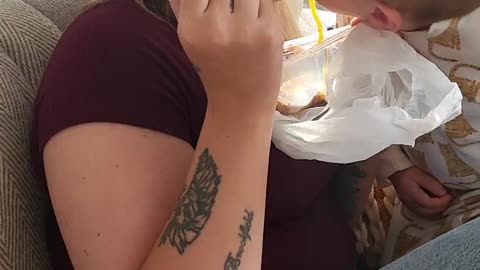 Toddler Steals Food From Mother's Mouth