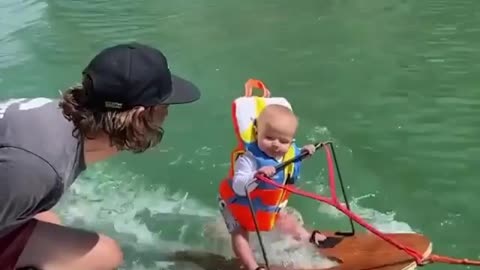 Cute baby it's swimming time cooler than others