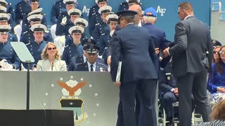 President Joe Biden falls on stage at the Air Force Graduation