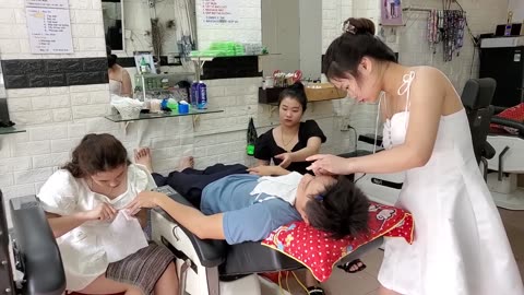 Happy to receive special care from 3 fairies, perfect relaxation service at Vietnam barber shop