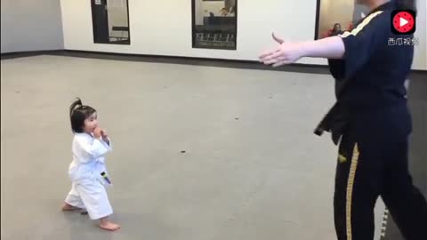 Cute Baby Practicing Taekwondo