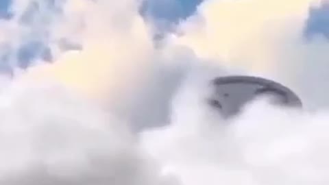 I HAVE NEVER SEEN A UFO AS BEAUTIFUL AS THIS COMING OUT OF THE CLOUDS