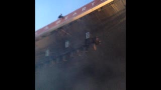 Crowd's Positive Chanting Keeps Man From Jumping Off Roof