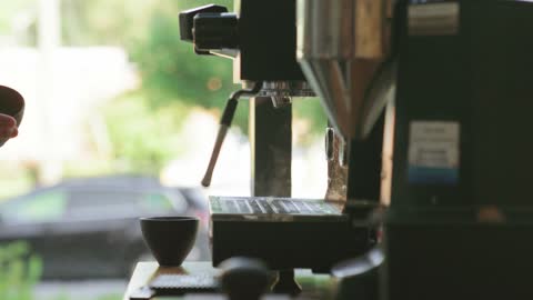 A Cup Of Coffee From A Coffee Making Machine