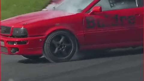 The racing car on the racetrack drifts and repairs the car.