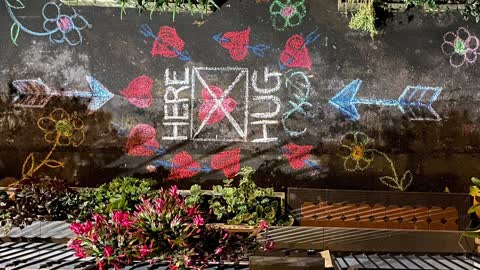 "Hug Here" Chalk Art Creates Heartwarming Moments