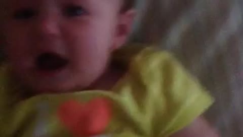Baby's sad reaction to mommy's sniffles