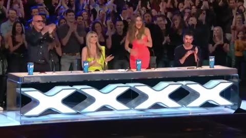 Golden Buzzer_ Putri Ariani receives the GOLDEN BUZZER from Simon Cowell _ Auditions _ AGT 2023