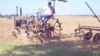 Un-styled John Deere A on Steel Wheels.