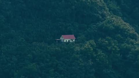 Mysterious Building Appears Isolated on Mountainside