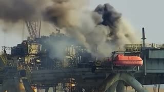 Large fire breaks out at a multi-story oil rig with hazardous materials in Mobile,