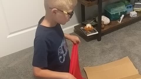 My grandson teaching me how to fold