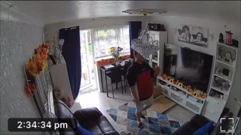 Guy Hits His Chandelier Then Dropping a Piece Out of It