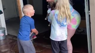 Parents Surprise Siblings With Puppy
