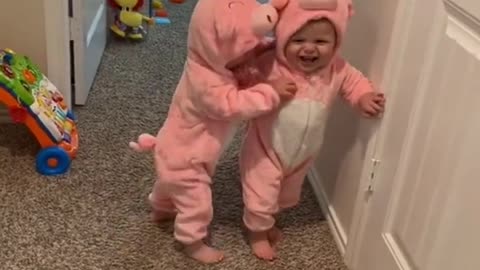 Happy twin baby moment