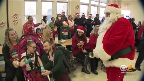 Santa surprises kids with special needs at L.I. PBA holiday party