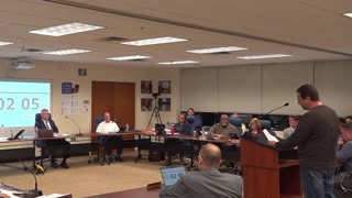 A man confronts a school board in West Chester, PA