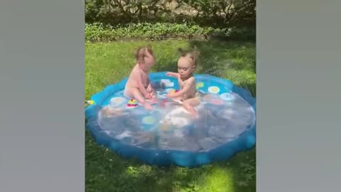 Funny Babies Playing With Water