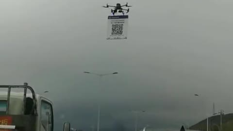 China:a police drone comes towards you on the highway, quickly scans your QR code