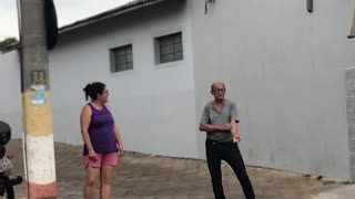 Bird Swoops Over Man's Head