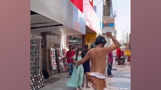 Passive Dancer brightens the day of street traders and public transport passengers
