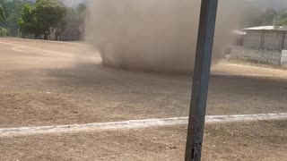 Powerful Dust Devil Interrupts Soccer Match