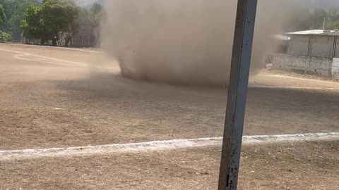 Powerful Dust Devil Interrupts Soccer Match