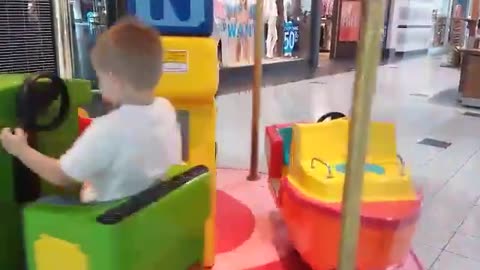 Luke Riding Trains At The Mall