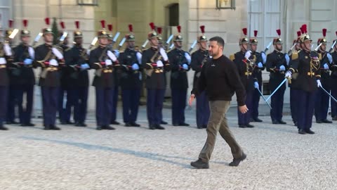 Macron greets Zelensky in Paris