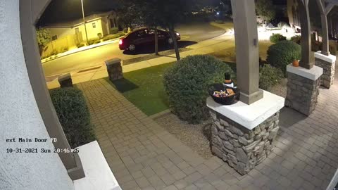 People in Car Pull Up and Steal Candy Basket