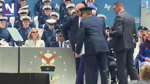 The "leader" of the free world falls on stage during the Air Force Academy graduation ceremony.