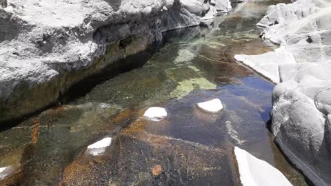 Wadi Dama,fresh water, with small fish.