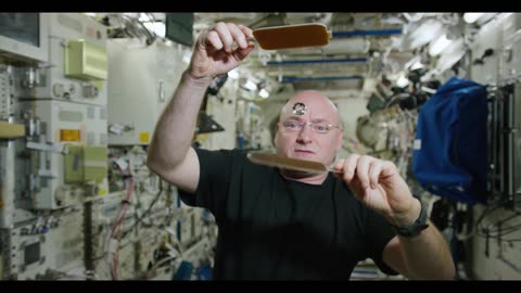 NASA Liquid Water Ping Pong Playing In Space: A Zero-Gravity Spectacle