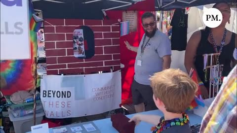 PRIDE SEATTLE: Adults encourage children to throw “bricks” at pictures of Republicans