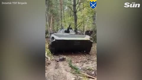 Ukrainian soldier shows off captured Russian BMP-1 fighting vehicle