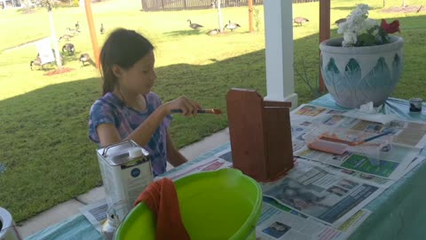 Painting My little birdies house before school starts.