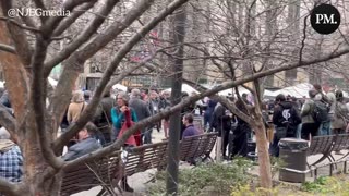 Trump Supporters And Protestors Waiting For His Arrival At The Manhattan Courthouse