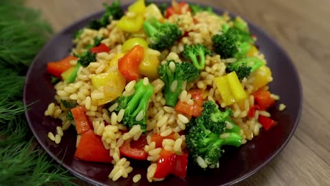 A simple recipe for rice with broccoli and peppers. A simple and delicious dinner!