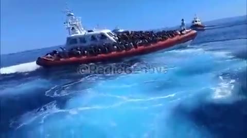This is the Italian coast guard ferrying in hundreds of African invaders.